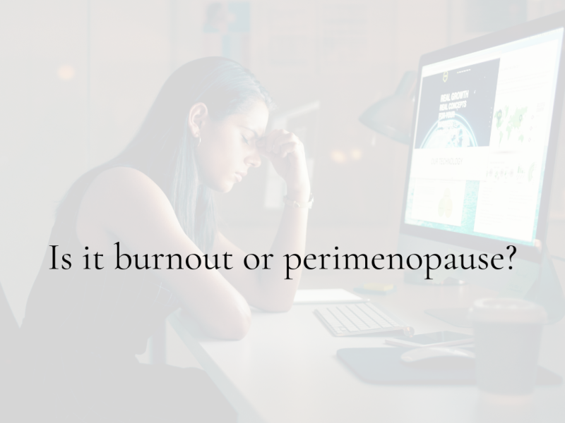 Women with head in hands at desk