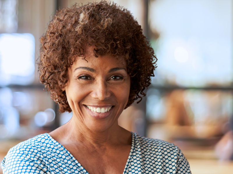 Woman standing smiling