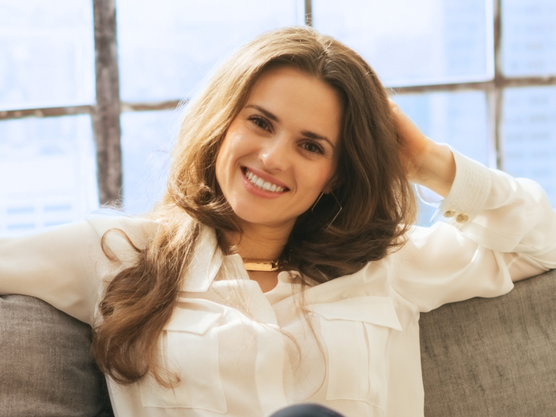 woman sitting smiling